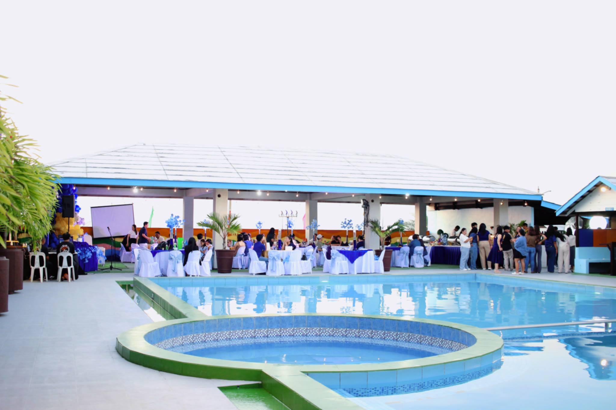 A poolside celebration with tables set for guests