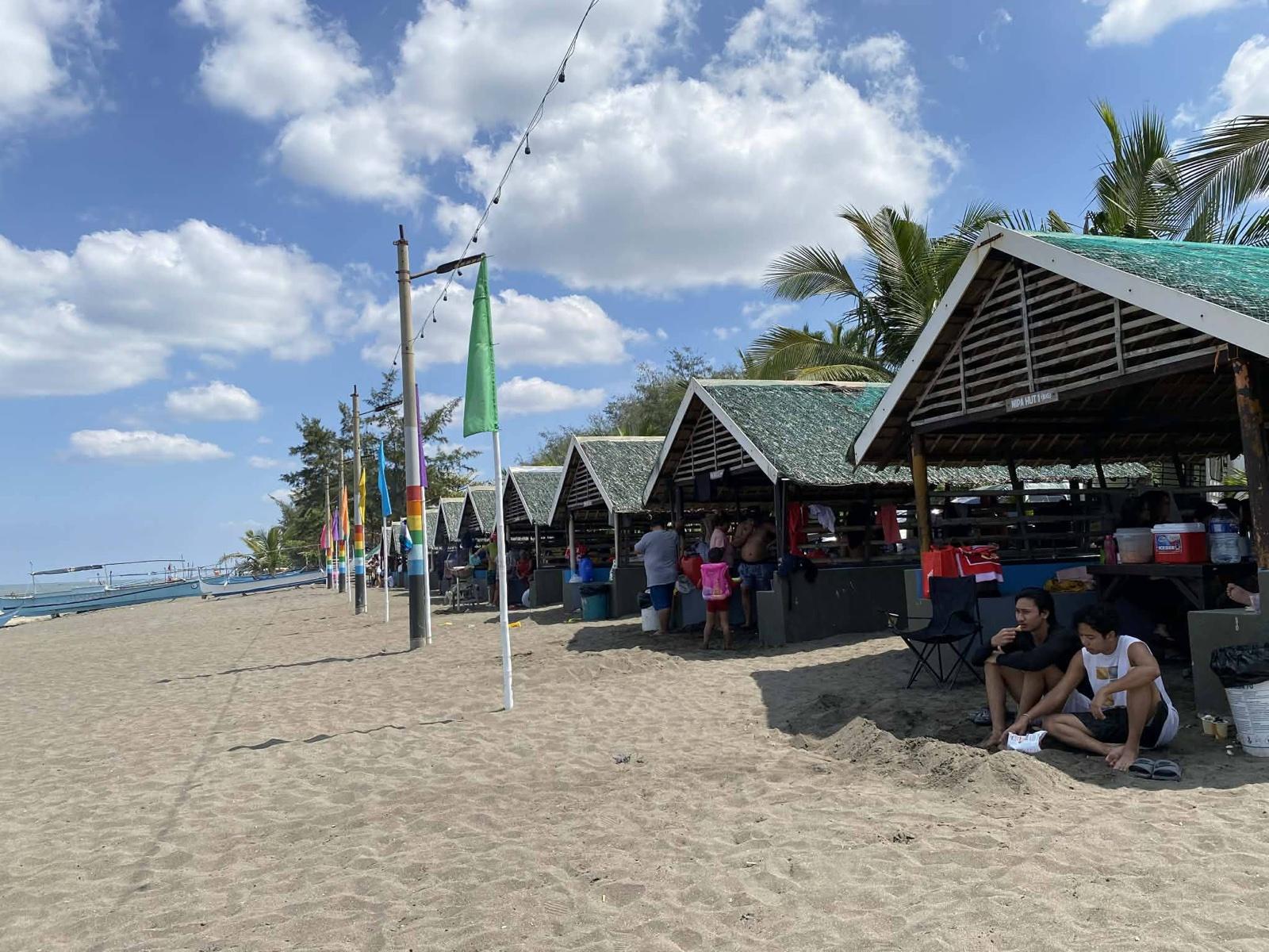 Nipa huts with shade for a family beach day